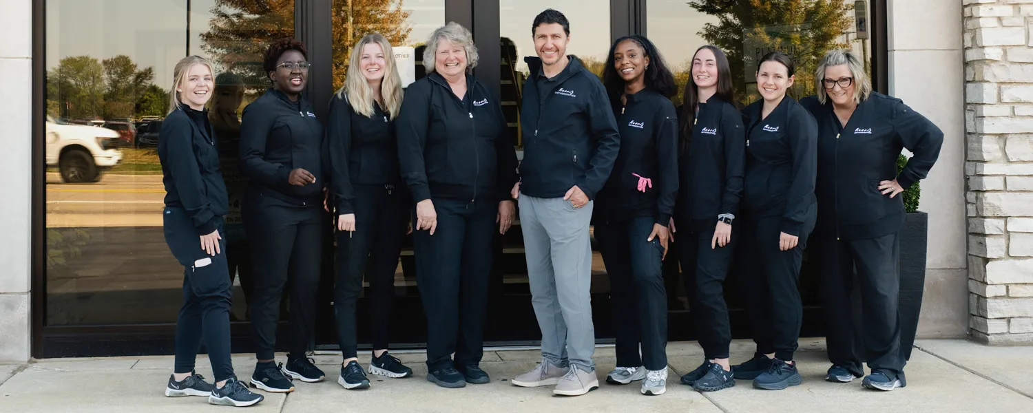 Masri Orthodontics team in Livonia, MI, smiling and welcoming patients.